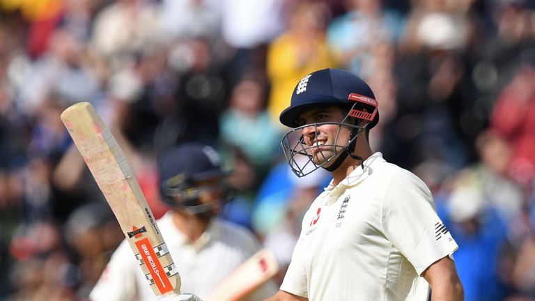 England's Alastair Cook celebrates reaching 200 on day two of the first Test between England and the Windies at Edgbaston in Birmingham