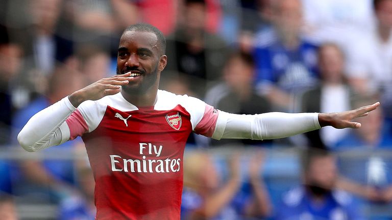 Alexandre Lacazette of Arsenal celebrates as he scores his team's third goal during the Premier League match between Cardiff City and Arsenal FC at Cardiff City Stadium on September 2, 2018 in Cardiff, United Kingdom.