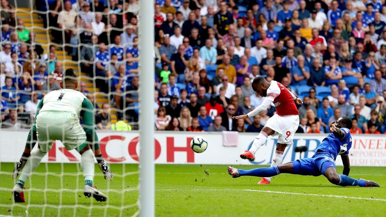 Alexandre Lacazette of Arsenal scores his team's third goal past Neil Etheridge of Cardiff City during the Premier League match between Cardiff City and Arsenal FC at Cardiff City Stadium on September 2, 2018 in Cardiff, United Kingdom.