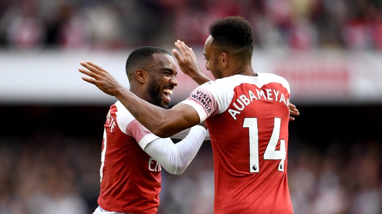 Alexandre Lacazette and Pierre-Emerick Aubameyang celebrate