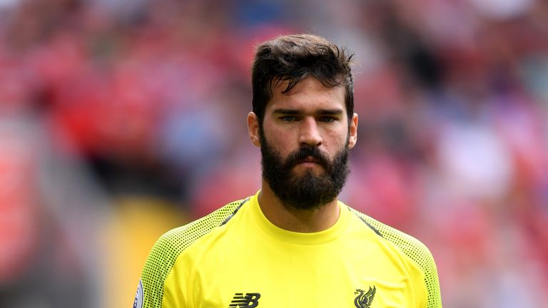 Alisson of Liverpool looks on during the Premier League match between Liverpool FC and West Ham United at Anfield on August 12, 2018 in Liverpool, United Kingdom