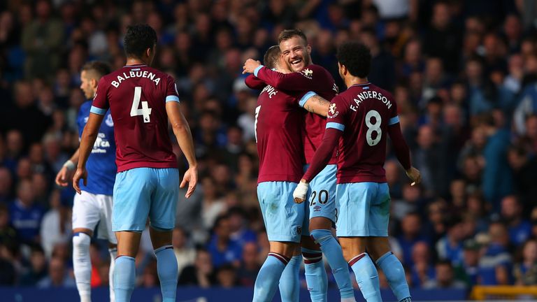 Andriy Yarmolenko of West Ham United celebrates with team-mates after scoring his second against Everton