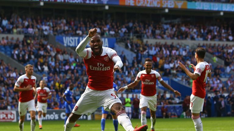 Arsenal's Alexandre Lacazette celebrates after setting up Arsenal's second goal against Cardiff
