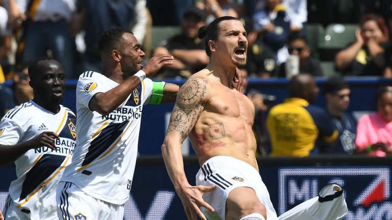 Ashley Cole and Zlatan Ibrahimovic celebrate with LA Galaxy