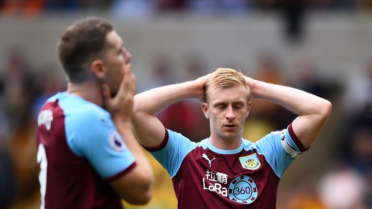 Burnley players react after conceding against Wolves