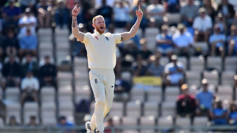 Ben Stokes celebrates taking a wicket against India