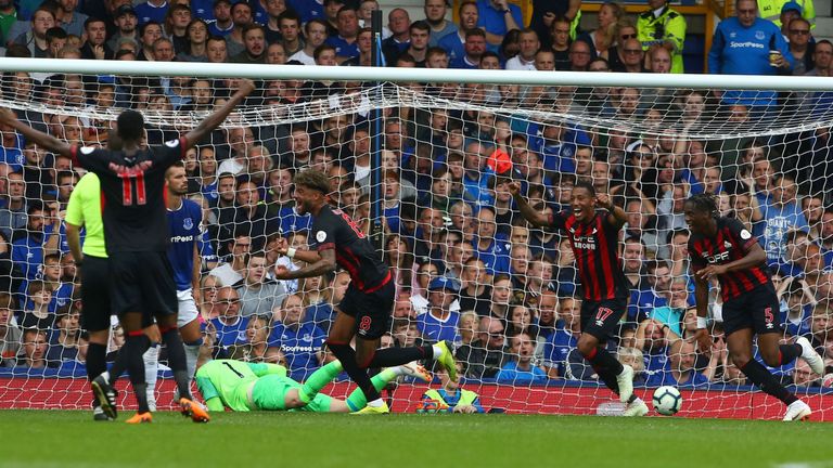 Philip Billing wheels away in delight after giving Huddersfield the lead on Saturday