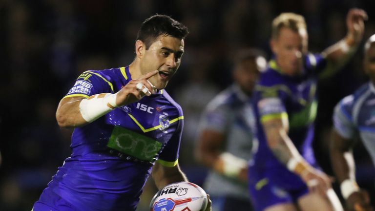 Bryson Goodwin of Warrington Wolves celebrates scoring a try against Huddersfield Giants