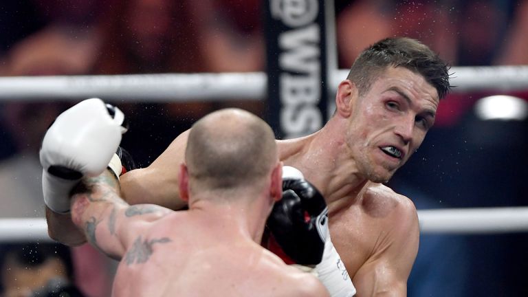 British boxers George Groves (front) and Callum Smith box during the World Boxing Super Series Super-Middleweight Ali Trophy Final at the King Abdullah Sports City in Jeddah, Saudi Arabia, on September 28, 2018. (Photo by AMER HILABI / AFP)        (Photo credit should read AMER HILABI/AFP/Getty Images)