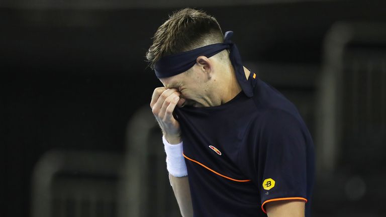 Cameron Norrie of Great Britain reacts after loosing his match against Jurabek Karimov of Uzbekistan in the Davis Cup