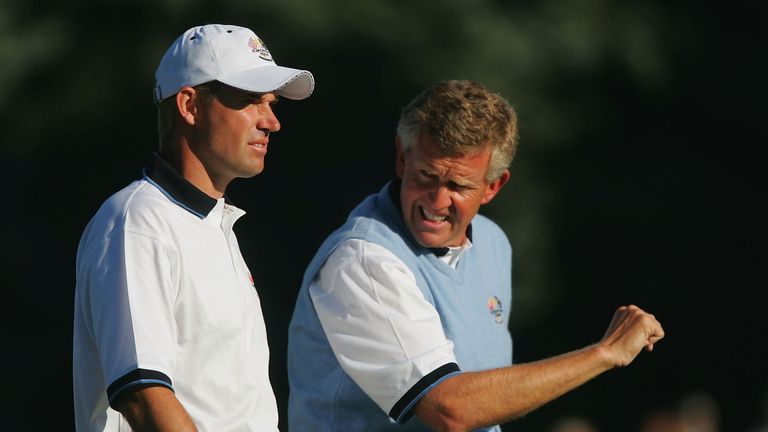 BLOOMFIELD TOWNSHIP, MI - SEPTEMBER 18: European team players Padraig Harrington of Ireland and Colin Montgomerie of Scotland walk up a fairway during their morning four-ball match against Stewart Cink and Davis Love III of the USA at the 35th Ryder Cup Matches at the Oakland Hills Country Club on September 18, 2004 in Bloomfield Township, Michigan. (Photo by Harry How/Getty Images) *** Local Caption *** Padraig Harrington;Colin Montgomerie