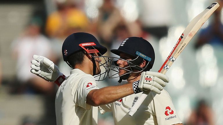 Alastair Cook of England celebrates making his century with Joe Root (R) during day two of the Fourth Test Match in the 2017/18 Ashes series between Australia and England at Melbourne Cricket Ground on December 27, 2017 in Melbourne, Australia. 