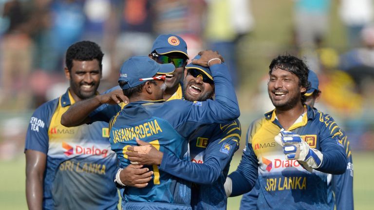 Sri Lanka players celebrate Lahiru Thirimanne's run-out of Jos Buttler at Kandy