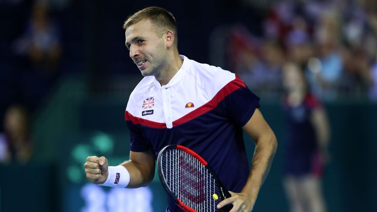 Dan Evans of Great Britain celebrates after winning the fourth set in his match against Denis Istomin of Uzbekistan during day one of the Davis Cup by BNP Paribas World Group single's play-off between Great Britain and Uzbekistan at Emirates Arena on September 14, 2018 in Glasgow, Scotland.