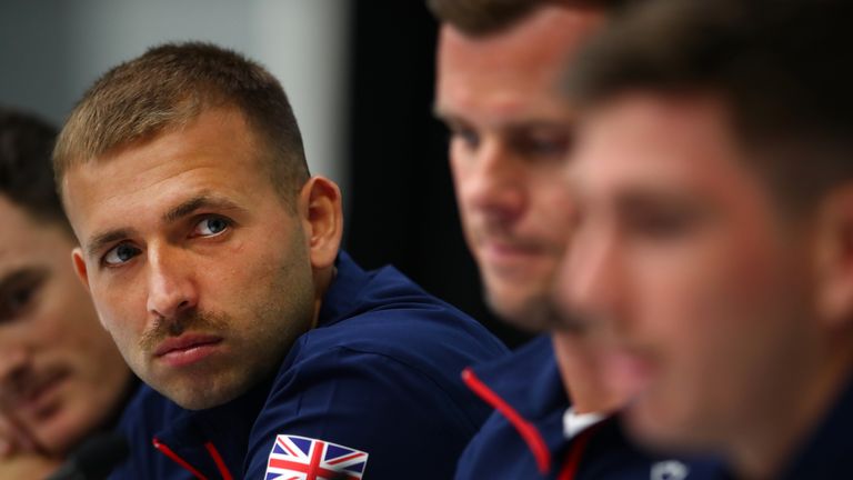 Dan Evans of Great Britain listens to Cameron Norrie during a press conference prior to the David Cup match between Great Britain and Uzbekistan at Emirates Arena on September 13, 2018 in Glasgow, Scotland.