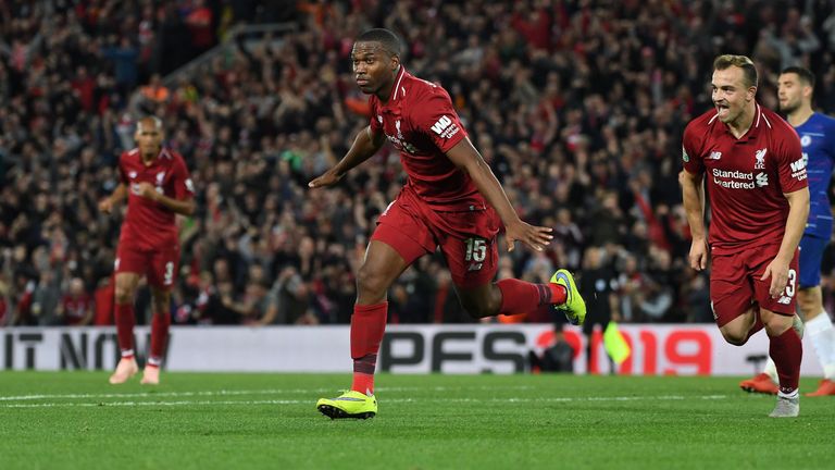Liverpool's English striker Daniel Sturridge celebrates scoring the opening goal during the English League Cup third round football match between Liverpool and Chelsea at Anfield in Liverpool, north west England on September 26, 2018. (Photo by Paul ELLIS / AFP) / RESTRICTED TO EDITORIAL USE. No use with unauthorized audio, video, data, fixture lists, club/league logos or 'live' services. Online in-match use limited to 120 images. An additional 40 images may be used in extra time. No video emulation. Social media in-match use limited to 120 images. An additional 40 images may be used in extra time. No use in betting publications, games or single club/league/player publications. /         (Photo credit should read PAUL ELLIS/AFP/Getty Images)
