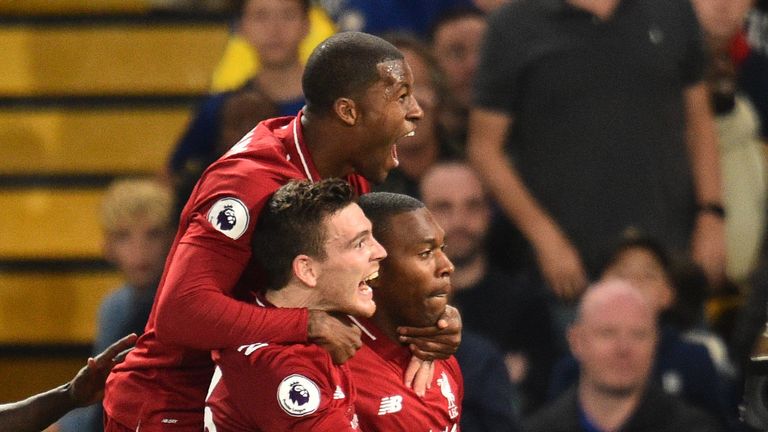 Daniel Sturridge celebrates with team-mates after scoring the team&#39;s first goal during the English Premier League football match between Chelsea and Liverpool at Stamford Bridge in London on September 29, 2018