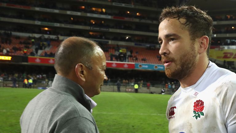 Eddie Jones, (L) the England head coach celebrates with Danny Cipriani after their victory during the third test match between South Africa and England at Newlands Stadium on June 23, 2018 in Cape Town, South Africa.