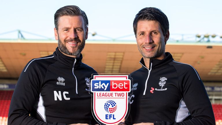 Danny Cowley of Lincoln City wins the Sky Bet League Two Manager of the Month award and poses with his brother and assistant Nicky Cowley - Mandatory by-line: Robbie Stephenson/JMP - 31/08/2018 - FOOTBALL - Sinsil Bank Stadium - Lincoln, England - Sky Bet Manager of the Month Award