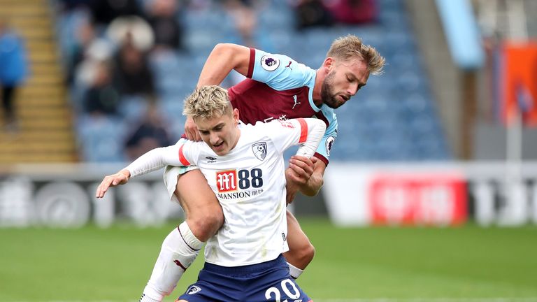Bournemouth&#39;s David Brooks is challenged by Charlie Taylor of Burnley