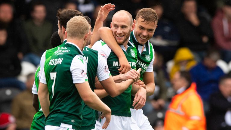 David Gray celebrates after opening the scoring for Hibernian against St Mirren