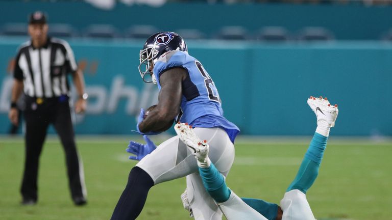 Delanie Walker suffers a severe ankle injury as he is tackled by T.J. McDonald