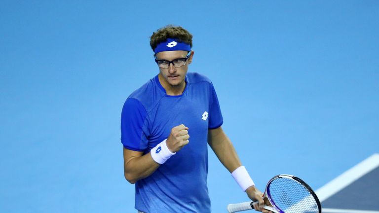 Denis Istomin of Uzbekistan celebrates winning the second set in his match against Dan Evans of Great Britain during day one of the Davis Cup by BNP Paribas World Group single's play-off between Great Britain and Uzbekistan at Emirates Arena on September 14, 2018 in Glasgow, Scotland.