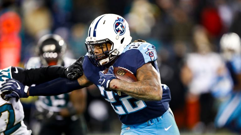 NASHVILLE, TN - DECEMBER 31: Running Back Derrick Henry #22 of the Tennessee Titans carries the ball against Corner Back Aaron Colvin #22 of the Jacksonville Jaguars at Nissan Stadium on December 31, 2017 in Nashville, Tennessee. (Photo by Wesley Hitt/Getty Images)  *** Local Caption *** Derrick Henry; Aaron Colvin