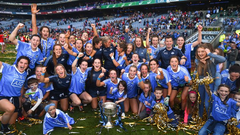 The Dublin team celebrate with the Brendan Martin Cup following the final win over Cork