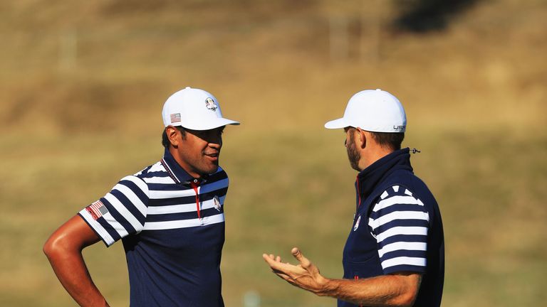 Dustin Johnson of the United States speaks with Tony Finau of the United States ahead of the 2018 Ryder Cup at Le Golf National on September 26, 2018 in Paris, France.  