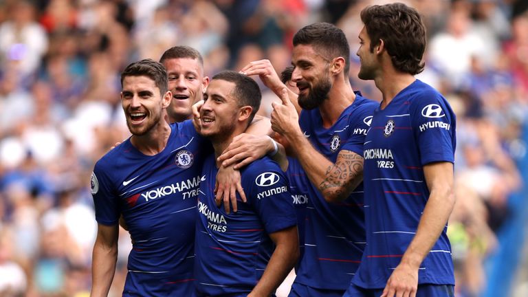 Eden Hazard celebrates with his Chelsea teammates after scoring in their 4-1 win over Cardiff.