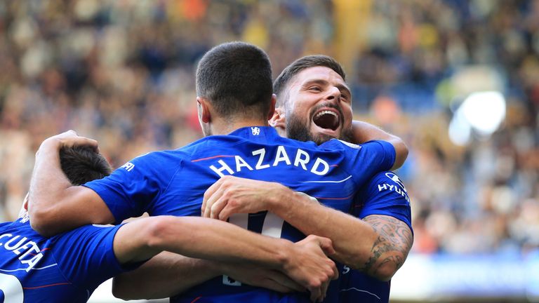 Eden Hazard celebrates with Olivier Giroud after the two combine in Chelsea's 4-1 win over Cardiff