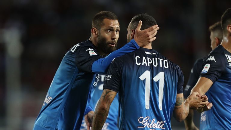 Empoli celebrate Caputo's goal after he brings them level against Milan