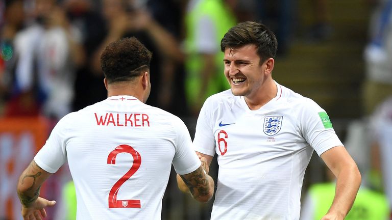 Kyle Walker of England and Harry Maguire of England celebrate after teammate Kieran Trippier scores their team's first goal during the 2018 FIFA World Cup Russia Semi Final match between England and Croatia at Luzhniki Stadium on July 11, 2018 in Moscow, Russia.