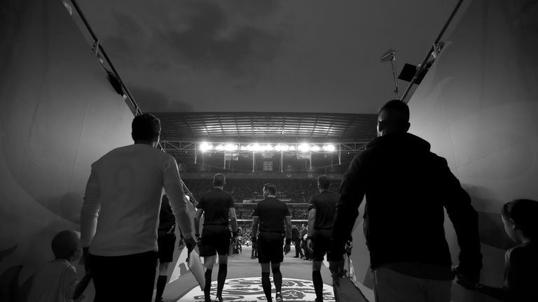 Match Officials and teams walk out to the pitch ahead of the UEFA Nations League A group four match between England and Spain