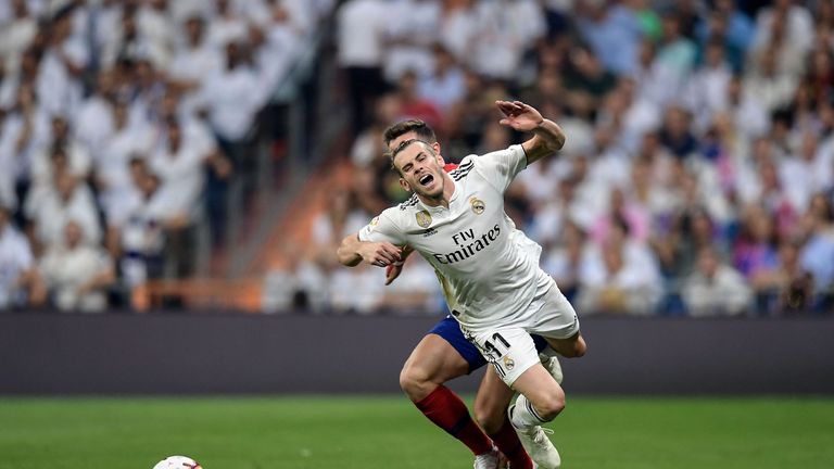 Gareth Bale is fouled as he attempts to get down the wing for Real Madrid