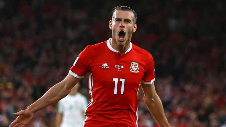 Wales' striker Gareth Bale celebrates after scoring their second goal during the UEFA Nations League football match between Wales and Republic of Ireland at Cardiff City Stadium in Cardiff on September 6, 2018. (Photo by Geoff CADDICK / AFP)        (Photo credit should read GEOFF CADDICK/AFP/Getty Images)