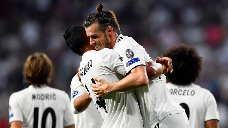 Real Madrid's Welsh forward Gareth Bale celebrates scoring his team's second goal during the UEFA Champions League group G football match between Real Madrid CF and AS Roma at the Santiago Bernabeu stadium in Madrid on September 19, 2018.