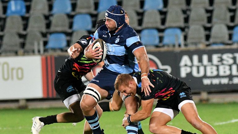 Cardiff's George Earle tackled by Giulio Bisegni of Zebre.