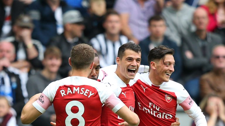 Granit Xhaka celebrates scoring against Newcastle