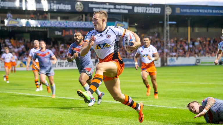 Castleford's Greg Eden evades the Catalans' defence to go on and score a try