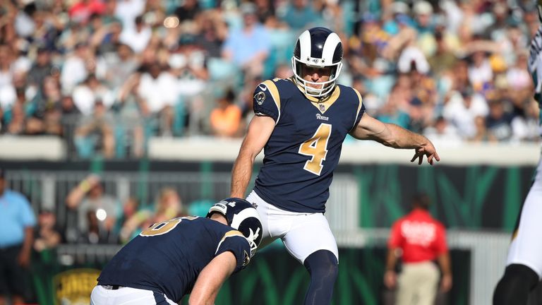 JACKSONVILLE, FL - OCTOBER 15:   Sean Mannion #14 of the Los Angeles Rams works out on the field prior to the start of their game against the Los Angeles Rams at EverBank Field on October 15, 2017 in Jacksonville, Florida.  (Photo by Sam Greenwood/Getty Images)