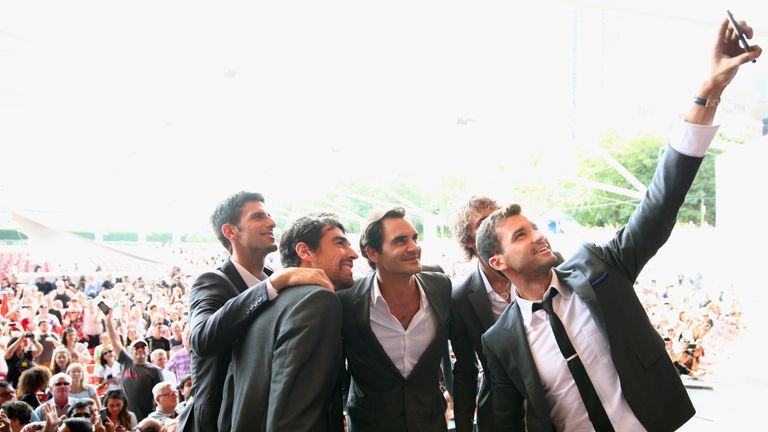 Grigor Dimitrov of Team Europe takes a selfie with team mates Roger Federer,Novak Djokovic,Jeremy Chardy and Alexander Zverev (hidden) at the official welcome ceremony prior to the Laver Cup at the United Center on September 19, 2018 in Chicago, Illinois.