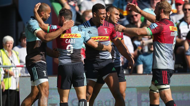 Nathan Earle of Harlequins (3rd R) celebrates scoring a try with his team mates during the Gallagher Premiership Rugby match between Harlequins and Sale Sharks at Twickenham Stoop on September 1, 2018 in London, United Kingdom.