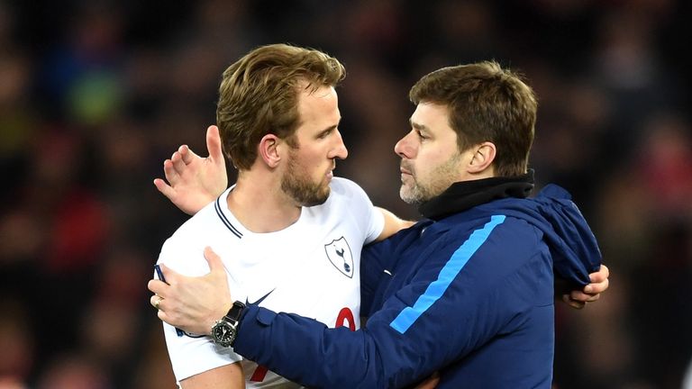 Harry Kane of Tottenham Hotspur and Mauricio Pochettino, Manager of Tottenham Hotspur celebrate vicotry after the Premier League match between Liverpool and Tottenham Hotspur at Anfield on February 4, 2018 in Liverpool, England.