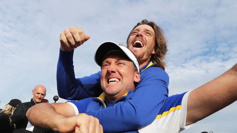 PARIS, FRANCE - SEPTEMBER 30:  Ian Poulter and Tommy Fleetwood of Europe celebrate winning the Ryder Cup during singles matches of the 2018 Ryder Cup at Le Golf National on September 30, 2018 in Paris, France.  (Photo by Richard Heathcote/Getty Images)