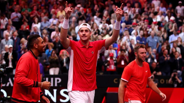 Team World Jack Sock of the United States and Team World John Isner of the United States celebrate with thier teammates after defeating Team Europe Roger Federer of Switzerland and Team Europe Alexander Zverev of Germany during their Men's Doubles match on day three of the 2018 Laver Cup at the United Center on September 23, 2018 in Chicago, Illinois.