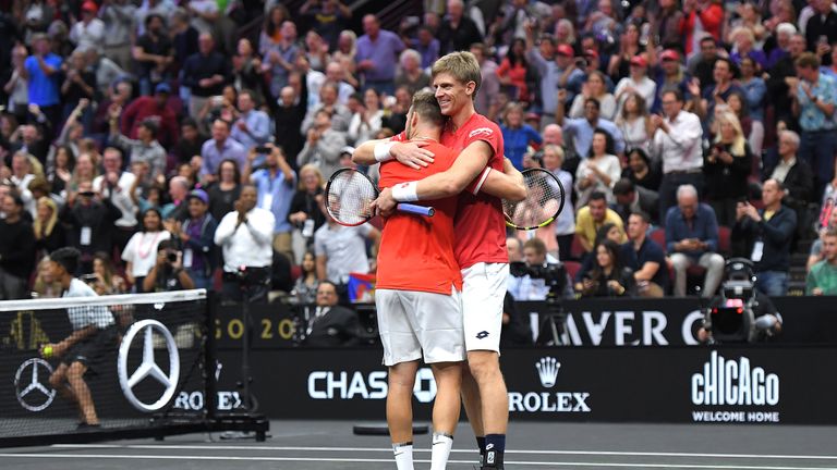 Team World Jack Sock of the United States and Team World Kevin Anderson of South Africa celebrate after defeating Team Europe Novak Djokovic of Serbia Team Europe Roger Federer of Switzerland in their Men's Doubles match on day one of the 2018 Laver Cup at the United Center on September 21, 2018 in Chicago, Illinois. 