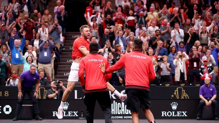 Team World Jack Sock of the United States celebrates with Team World Frances Tiafoe of the United States and Team World Nick Kyrgios of Australia after defeating Team Europe Roger Federer of Switzerland and Team Europe Alexander Zverev of Germany in their Men&#39;s Doubles match on day three of the 2018 Laver Cup at the United Center on September 23, 2018 in Chicago, Illinois