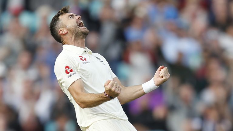 James Anderson celebrates claiming the wicket of Cheteshwar Pujara